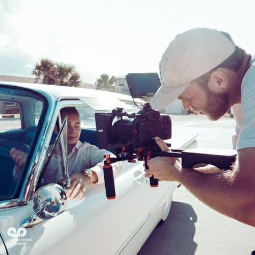 man-filming-car-production-LA